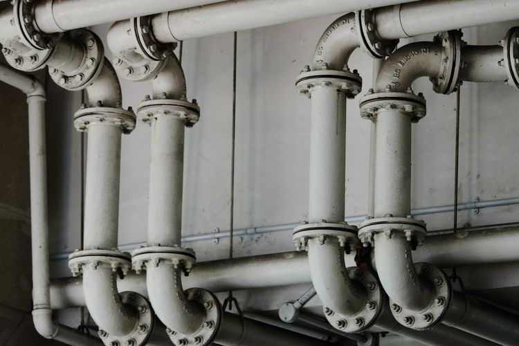 Flanged water pipes and bends in a commercial plant room